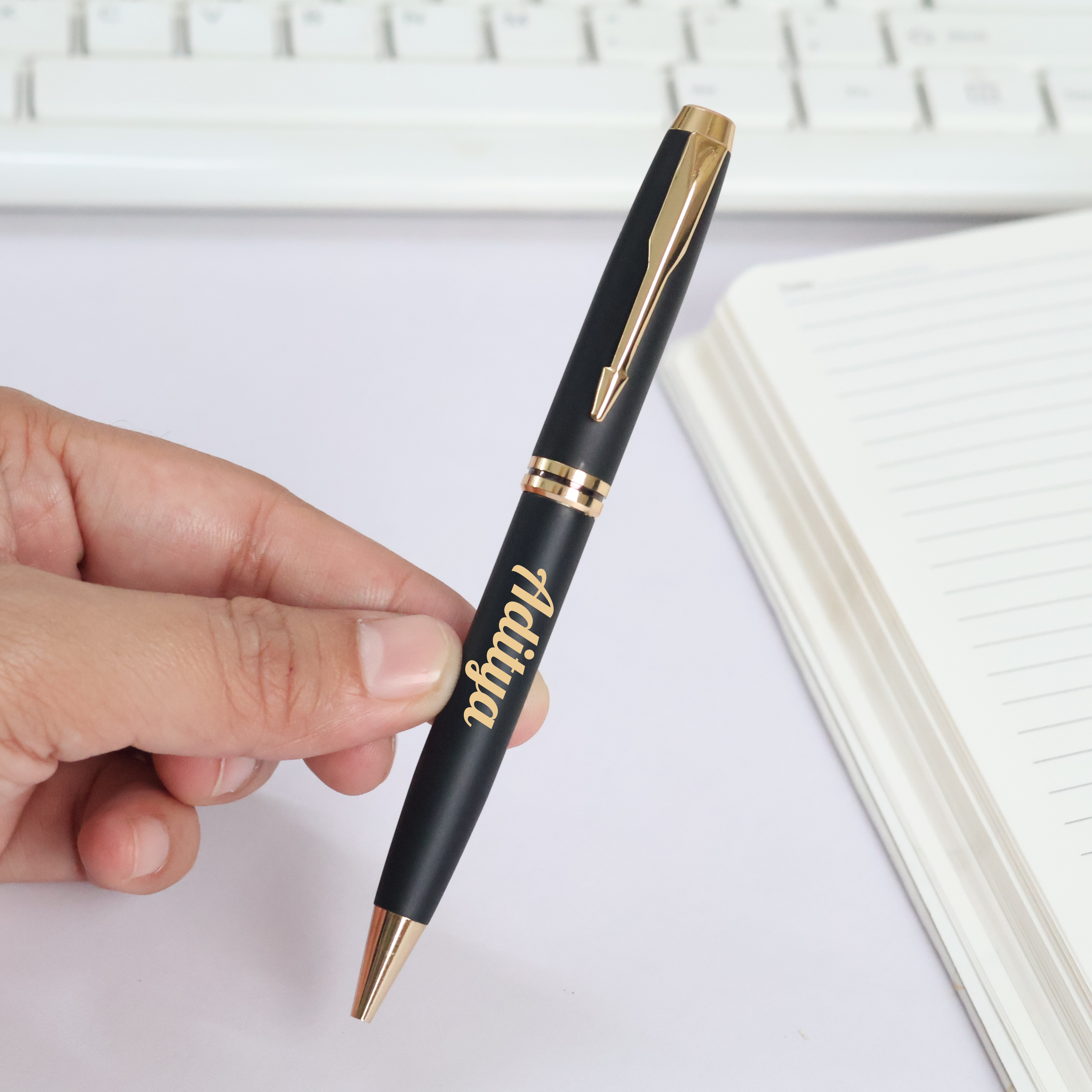 Gold engraving closeup – premium metal pen – personalised corporate gift